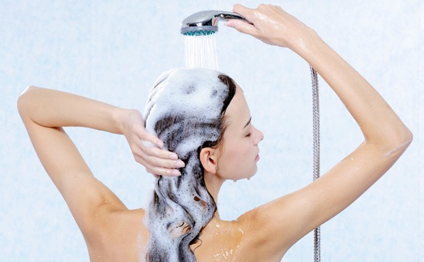 Woman Shampooing Hair